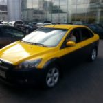 Ford Focus желтое такси